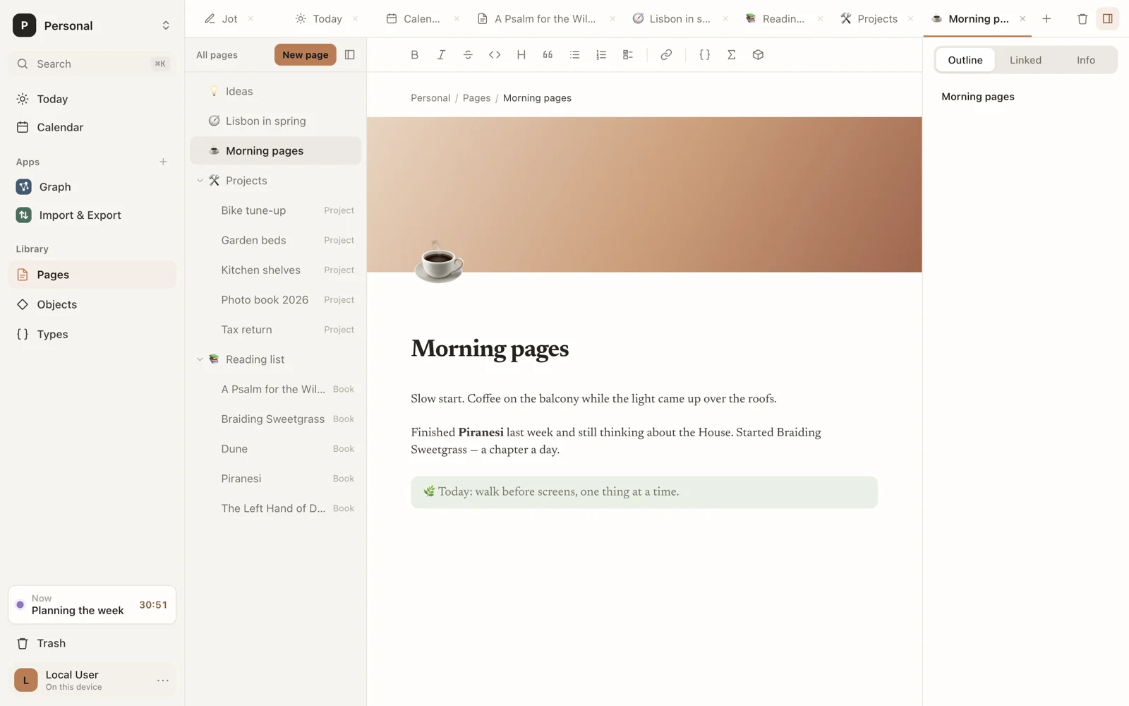 A serif journal page with a cover and an icon